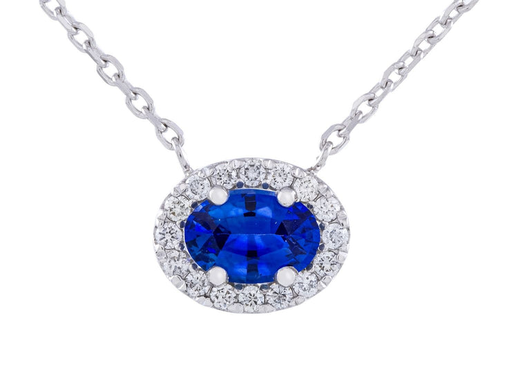 14K White Gold Sapphire Halo Necklace with 0.15 CTW Diamonds
