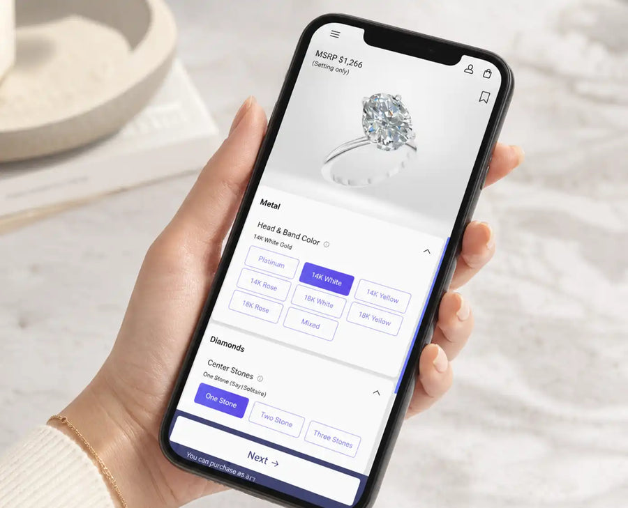 Designing a custom engagement ring in the Lustig online ring builder on a phone