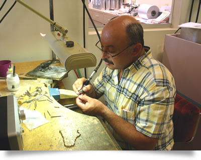 Our bench jeweler, Roman, creates unique jewelry design creations