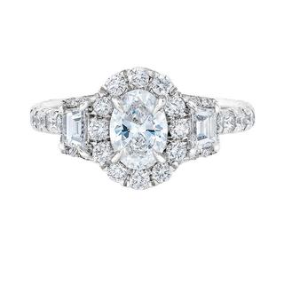 White gold engagement ring with oval center diamond