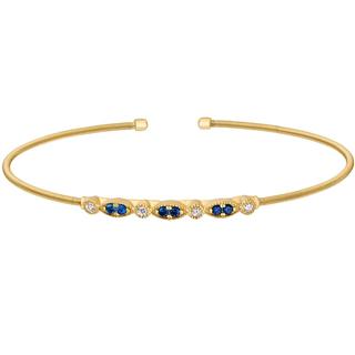 Sterling silver cable cuff bracelet with a gold finish and simulated diamonds