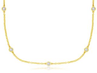 Yellow gold diamond nine station necklace