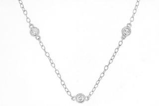 White gold sixteen diamond station necklace