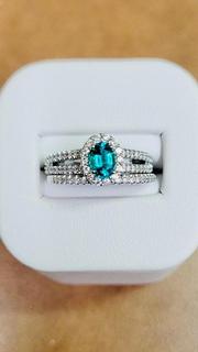 Promezza diamond engagement ring with emerald center 