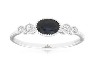 White gold bezel set sapphire and diamond ring