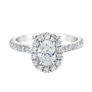 White gold engagement ring with oval center diamond