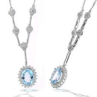 White gold diamond necklace with an oval aquamarine
