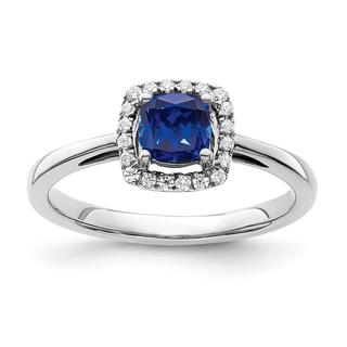 Created blue sapphire and diamond ring in white gold