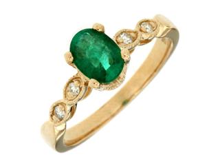 Yellow gold diamond ring with oval emerald center