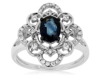 White gold diamond ring with oval sapphire center