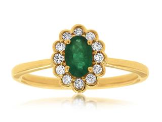 Yellow gold diamond ring with oval emerald center